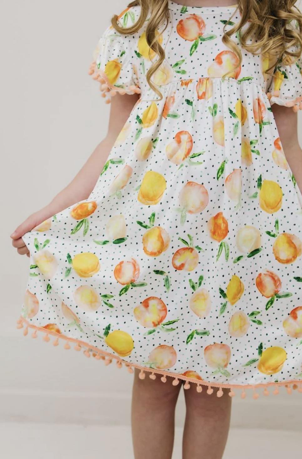 You're a Peach Pom Pom Dress